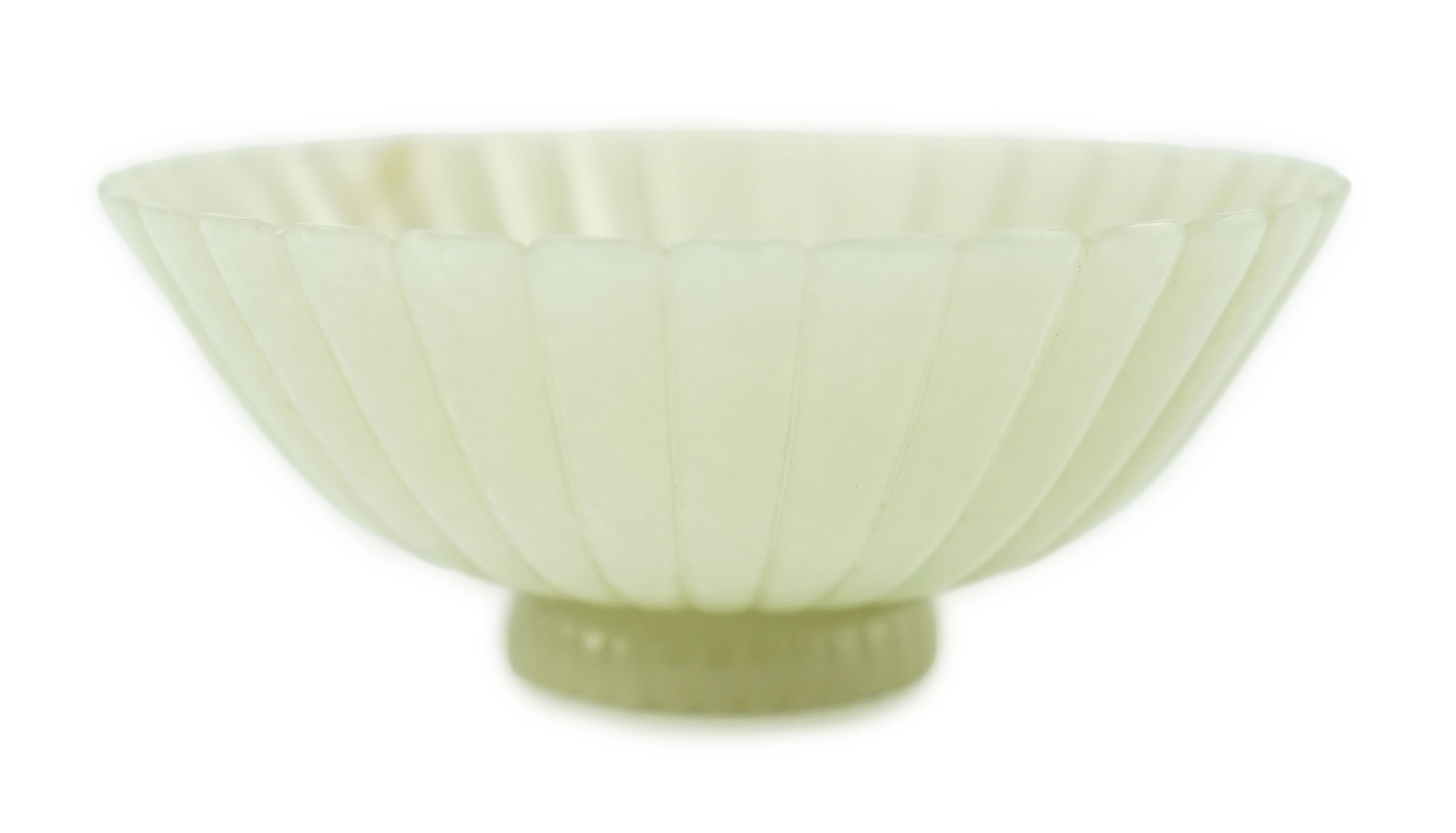 A fine Chinese Mughal style celadon jade ‘chrysanthemum’ bowl, 18th/19th century, 9.4cm diameter